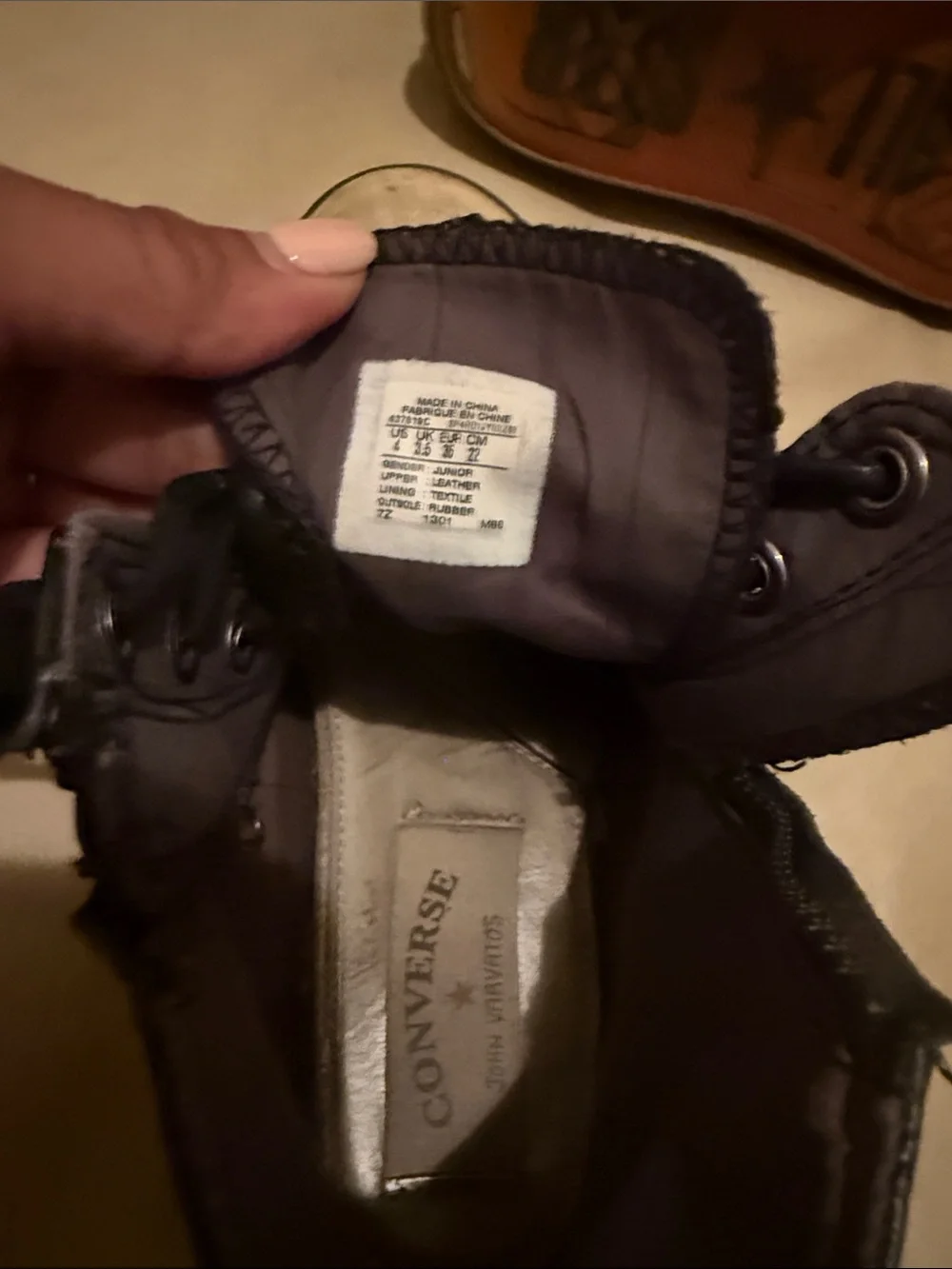 Converse Black High-Top Sneakers with Off-White Toe Caps
